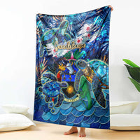 Blue sea turtle tropical blanket, 'Guadeloupe' logo and colorful reef graphics on front