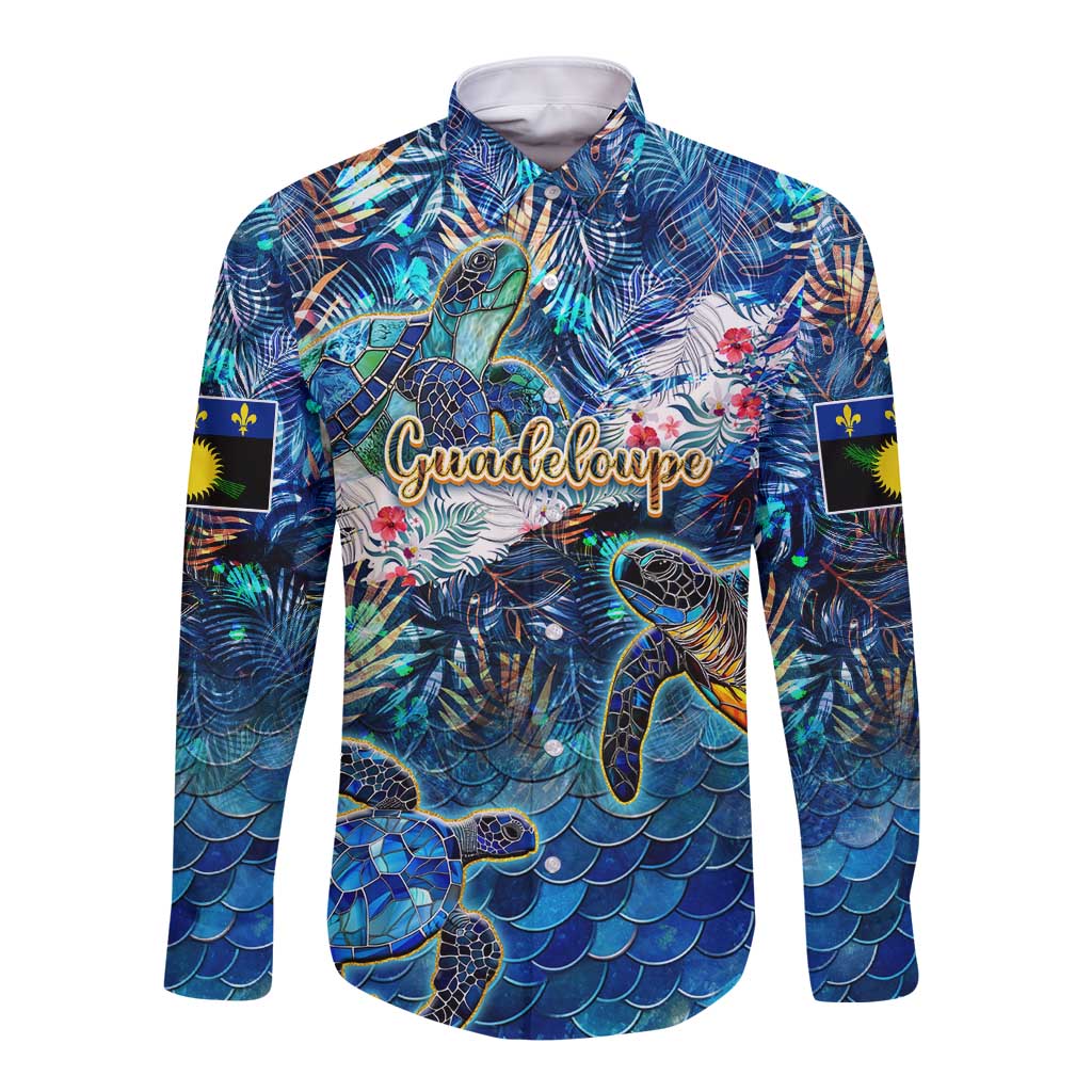 Blue long-sleeve button-up shirt with sea turtle tropical print, front graphic