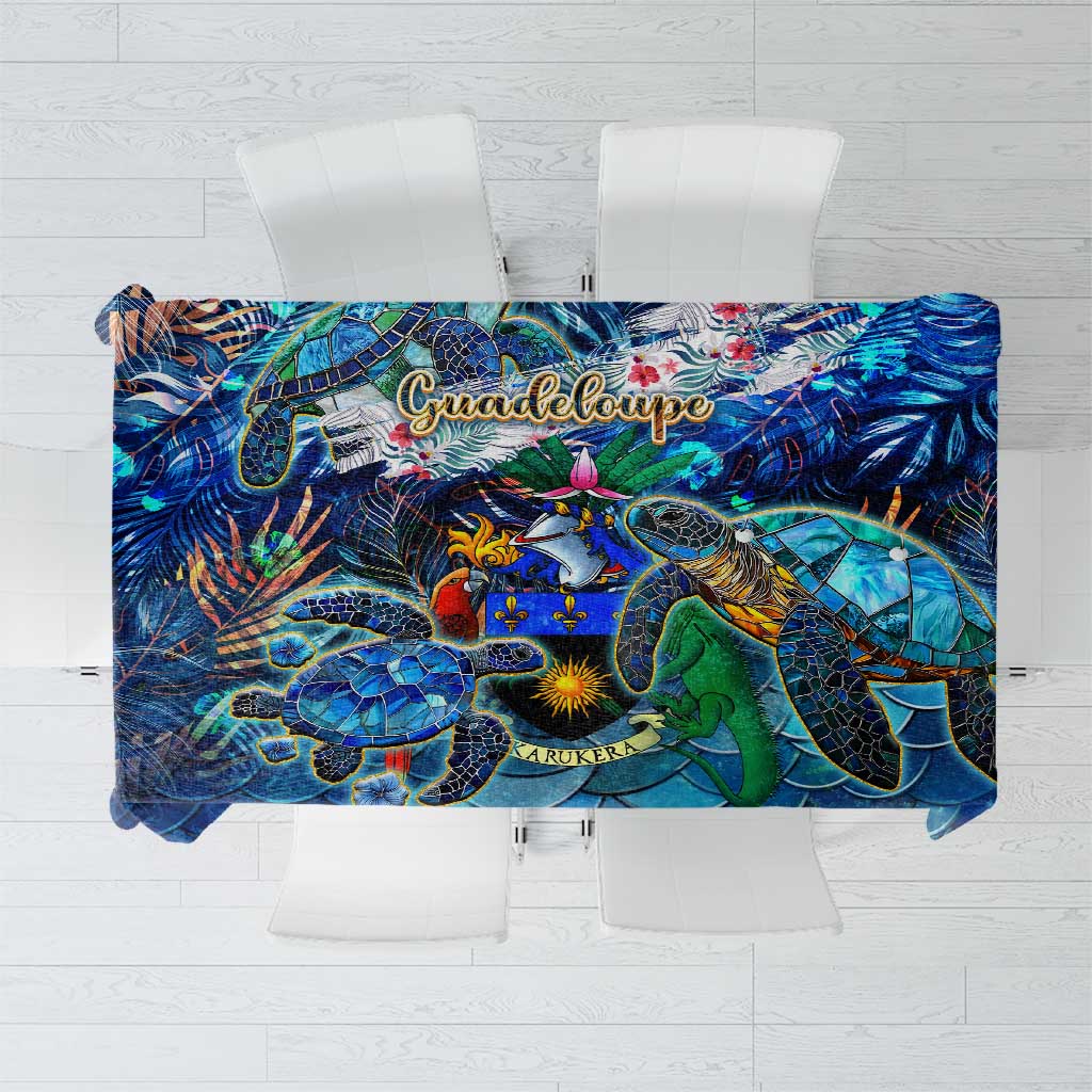 Blue sea turtle tropical tablecloth with colorful underwater animals and “Guadeloupe” print