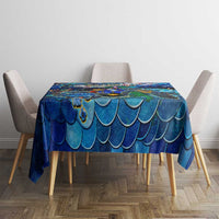 Blue sea turtle tablecloth with ocean-scale pattern on a square dining table