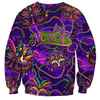 Purple long-sleeve Mardi Gras sweatshirt with central glitter mask and ornate decorative border