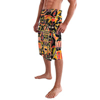 Men's lavalava shorts with colorful tribal face print, elastic waist, side view