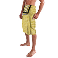 Yellow African patterned lavalava/dashiki wrap skirt with dark trim, side view