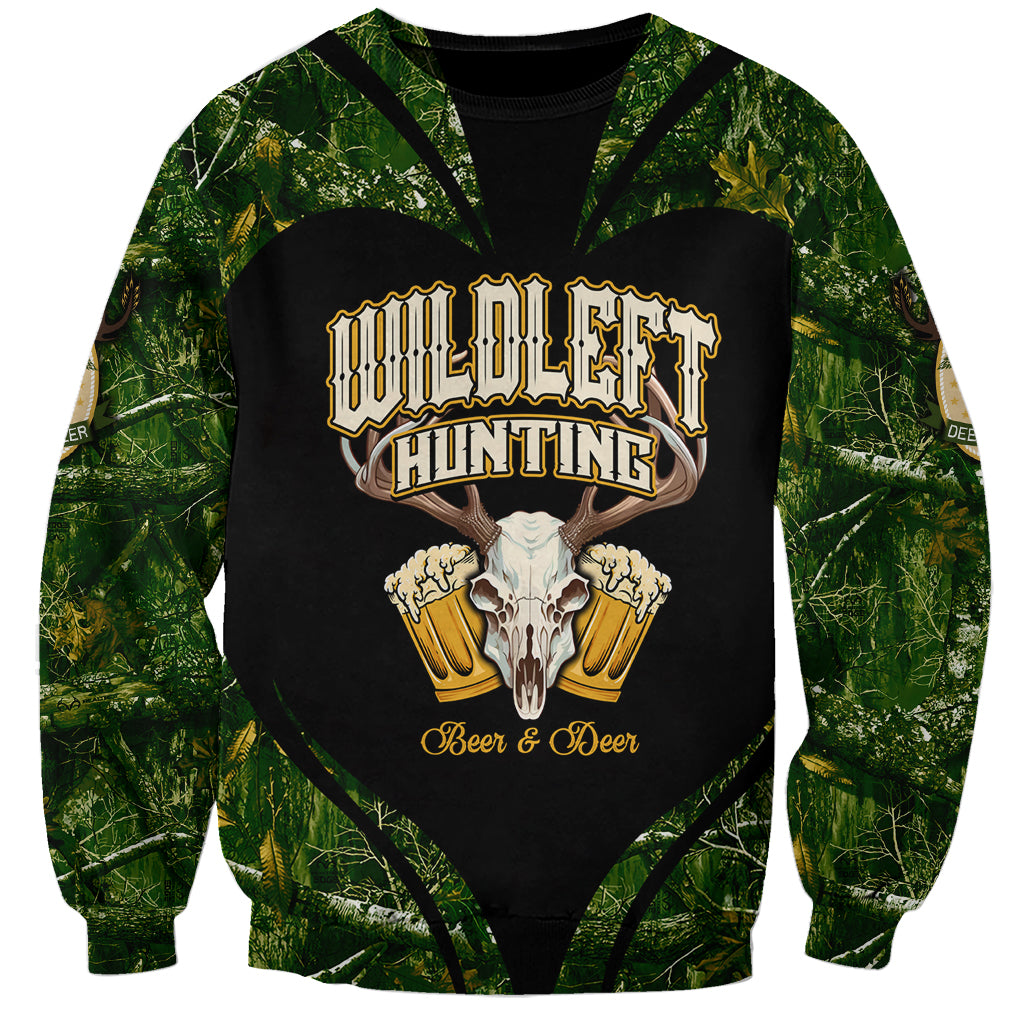 Green sweatshirt with wildlife hunting graphic, deer skull, and beer mugs on black panel