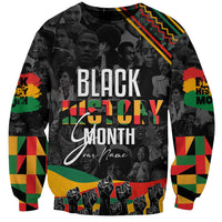 Black unisex sweatshirt with 'BLACK HISTORY MONTH' front print and color-block sleeve cuffs