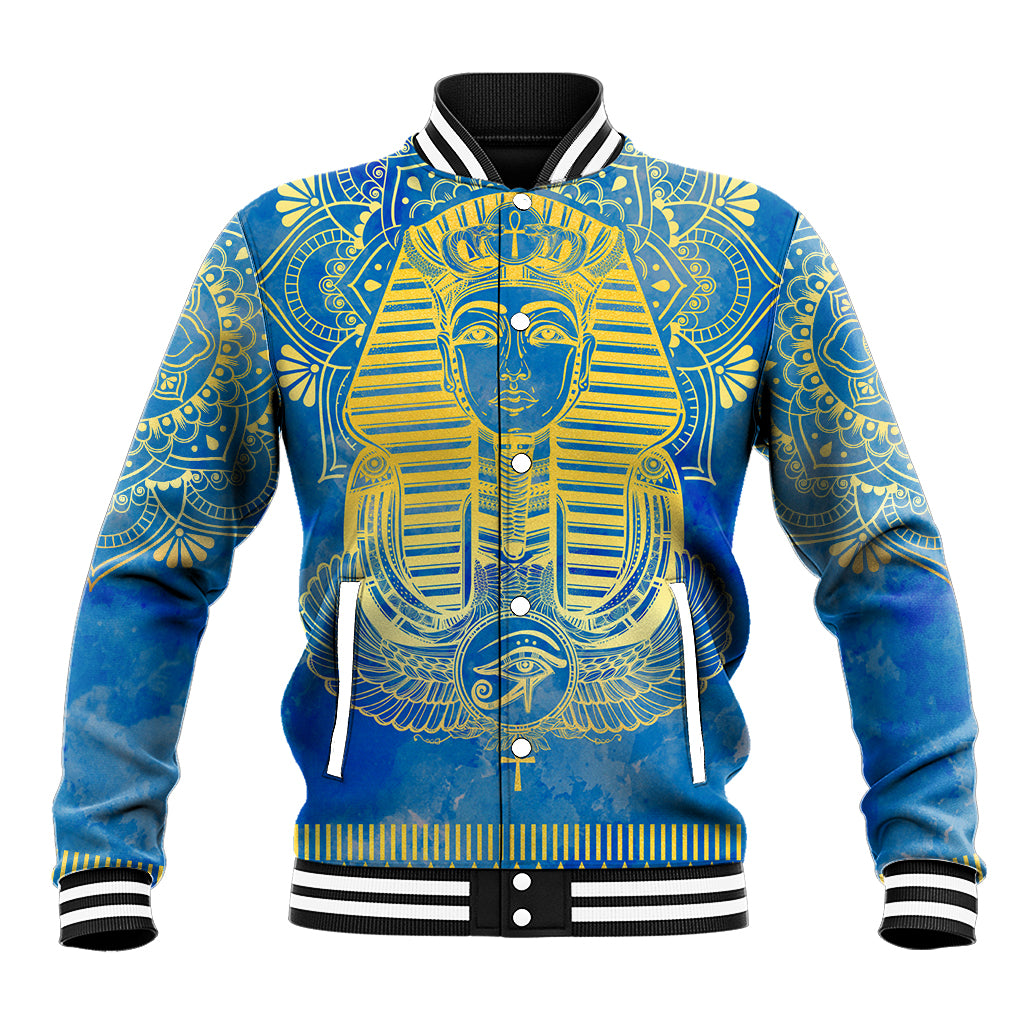 Blue baseball jacket with gold Egyptian pharaoh graphic, snap front and striped rib trim