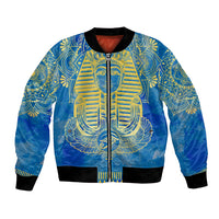 Blue bomber jacket with gold Eye of Horus and Egyptian pharaoh graphic, front zipper