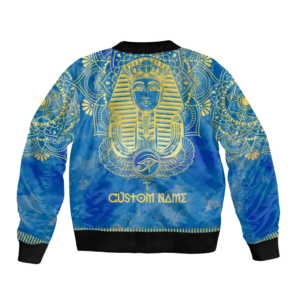 Blue bomber jacket back with pharaoh head, gold mandala print and custom name text