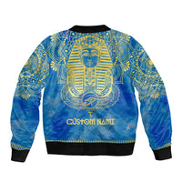 Blue bomber jacket back with pharaoh head, gold mandala print and custom name text