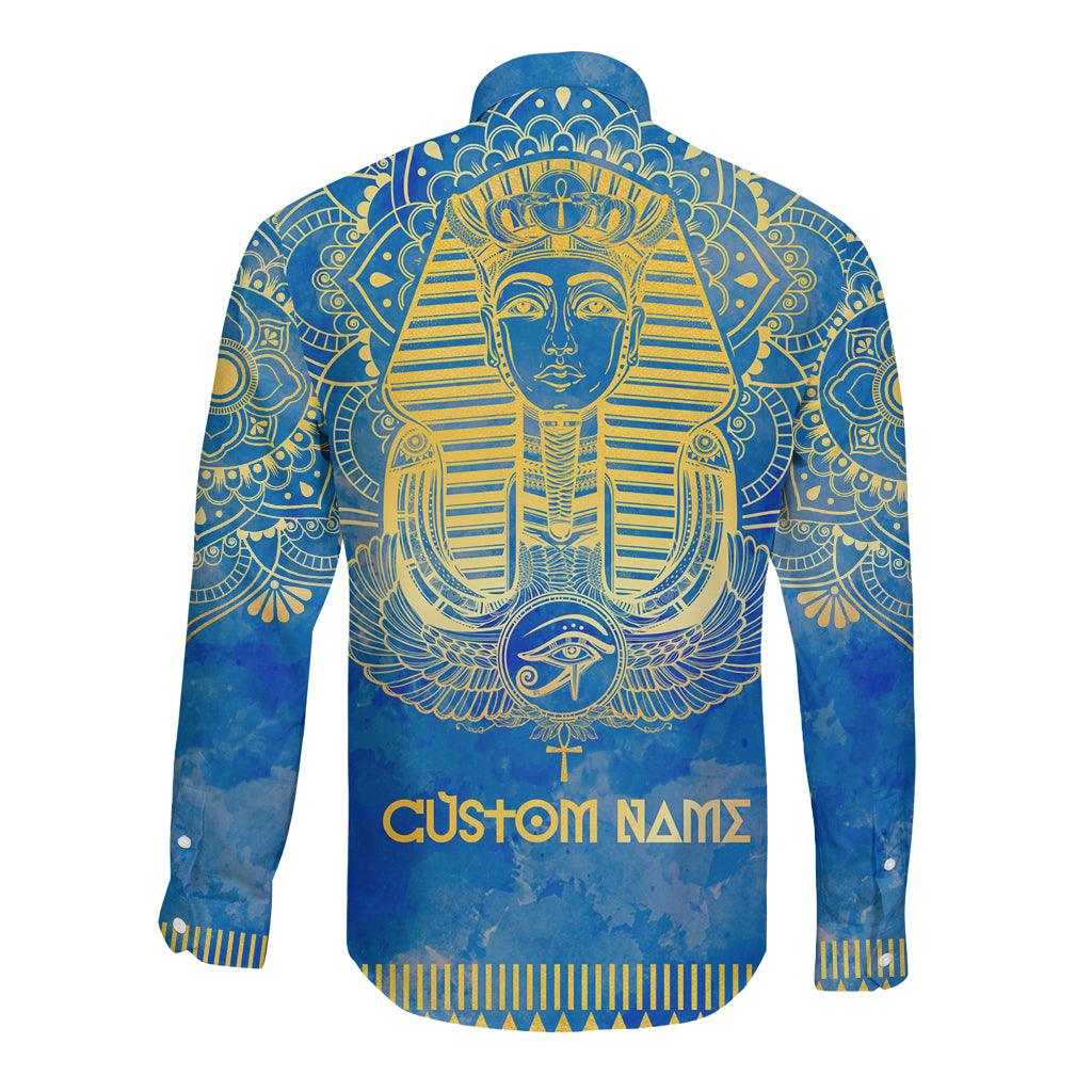 Blue long-sleeve button shirt with gold pharaoh graphic and Custom Namz text back