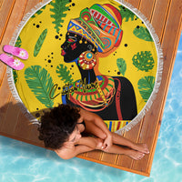 Yellow round beach blanket with fringe, African woman portrait design, person lying on it