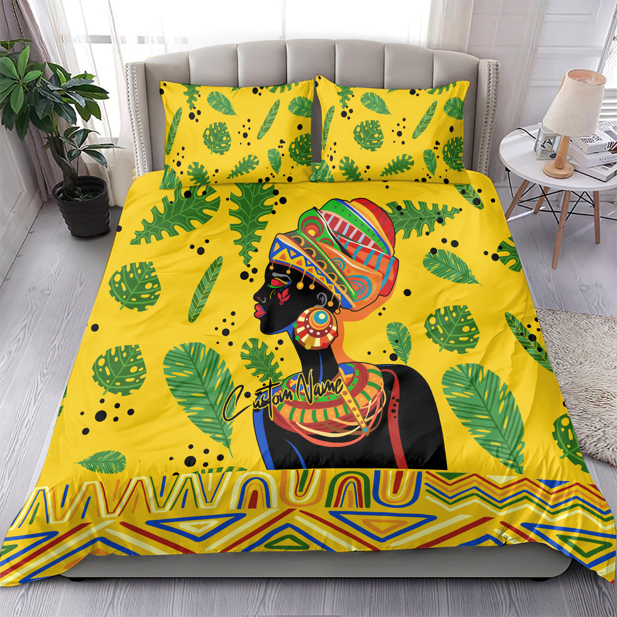 Yellow bedding set featuring green leaves and colorful portrait graphic, with matching pillowcases