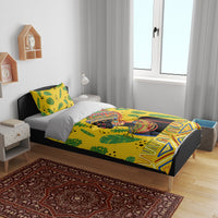 Yellow bedding set with green leaves and colorful African woman artwork across duvet