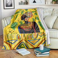 Yellow tropical blanket with woman portrait, green leaves, and geometric border