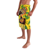 Yellow wrap lavalava skirt with colorful tribal figure print and geometric band design
