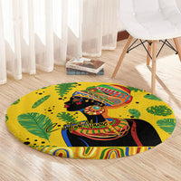 Round yellow area rug with African woman graphic, tropical leaves, and centered name text