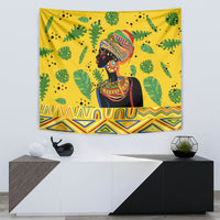 Yellow tapestry with African woman portrait, green leaves, and geometric bottom stripe