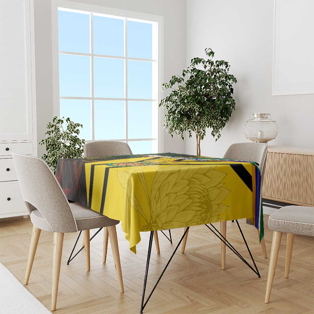 South Africa coat of arms tablecloth draped on dining table, yellow and green flag-style print