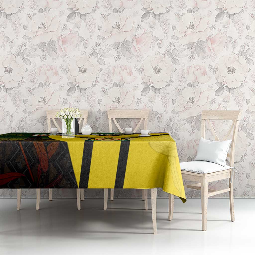 South Africa coat of arms tablecloth on dining table with yellow and black striped protea design