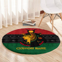 Round Egyptian queen goddess area rug in red, black, and green with custom name lettering