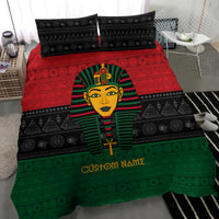Pharaoh duvet cover with green and red bands, black pattern backdrop, 'Custom Namz'