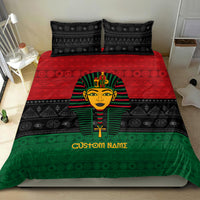 Pharaoh bedding set on bed with black pillows, red/green bands, and 'Custom Namz'