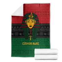 Personalized pharaoh blanket shown flat with pharaoh portrait, red-black-green design