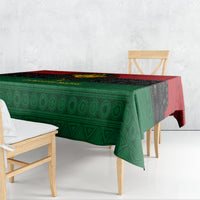 Green and black tablecloth with red top stripe, geometric Egyptian pattern