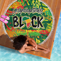 Round green beach blanket with fringe, "Unapologetically BLK" and "Your Name" centerpiece