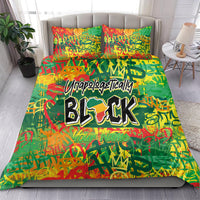 Colorful green bedding set with bold black graphic lettering on duvet and two pillow shams