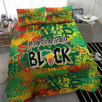 Colorful green bedding set with bold black graphic lettering and matching pillowcases