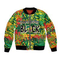 Green graffiti bomber jacket with zipper, ribbed cuffs, and 'Unapologetically Black' print