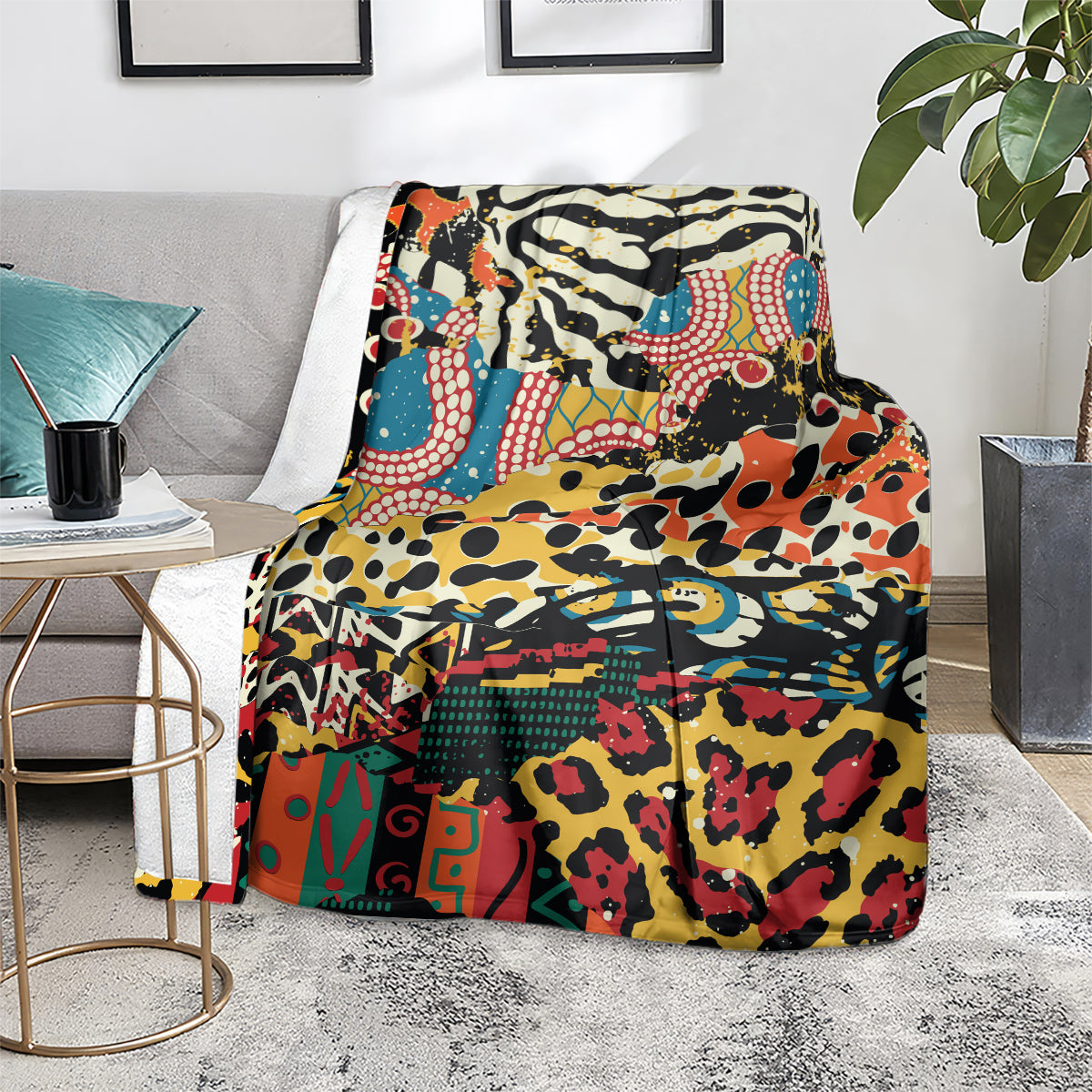 Multicolor animal-pattern fleece blanket laid on floor near side table, vivid print.