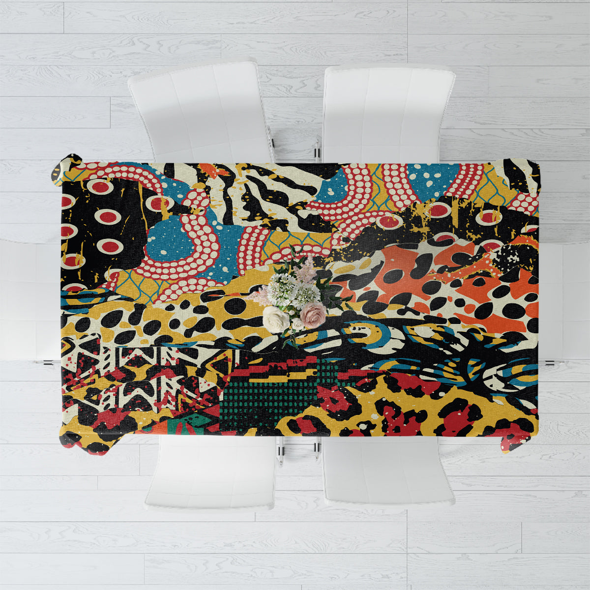Africa animal-pattern tablecloth with multicolor abstract wildlife print, draped on a table