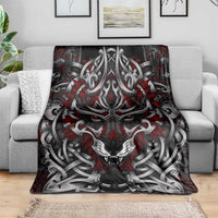 Fenrir wolf blanket covering couch, red highlights around fierce wolf head in knotwork