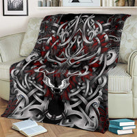 Fenrir wolf blanket on couch, large wolf face with red accents and gray knotwork