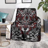 Fenrir wolf blanket spread on floor, snarling wolf face with red accents and gray knotwork
