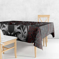 Viking wolf tablecloth, dark gray with red lines and wolf emblem across tabletop.