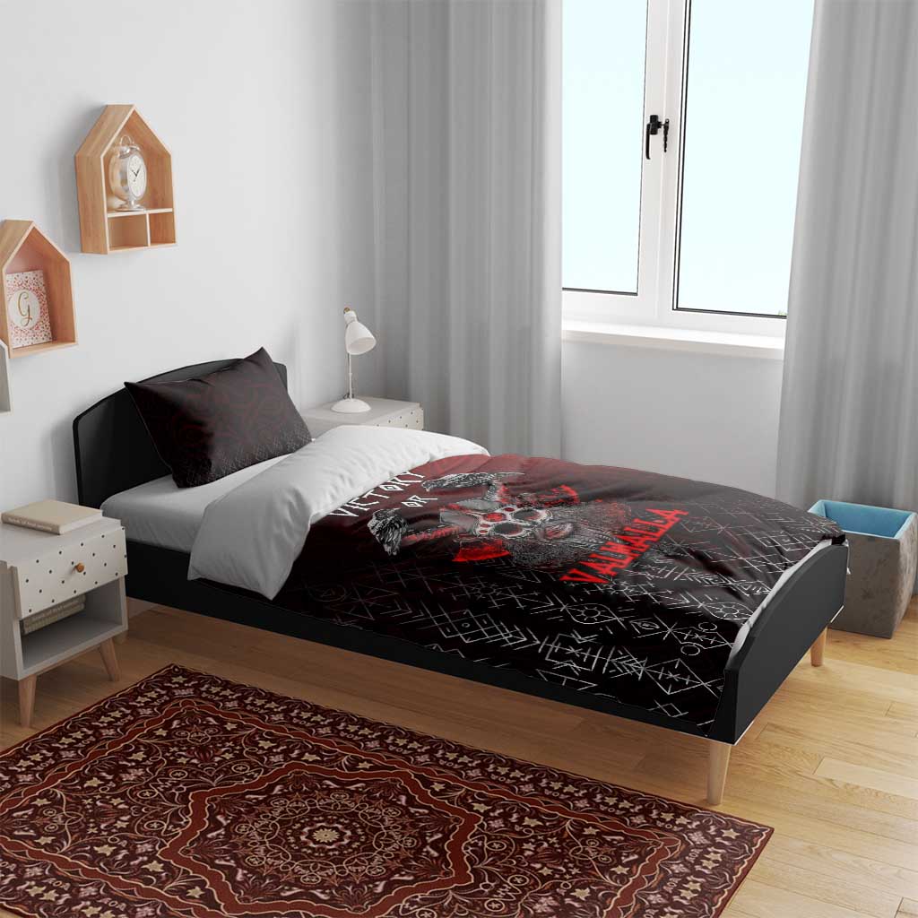 Red and black Viking bedding set on bed with skull and ravens design, dark pillow pair