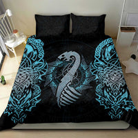 Blue and black duvet with dragon rune centerpiece and two black pillow covers