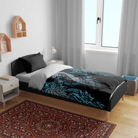 Blue and black dragon rune duvet cover with pillowcases on a bed