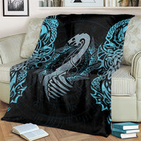 Dragon and runes blanket over couch back, black with blue teal knot detailing