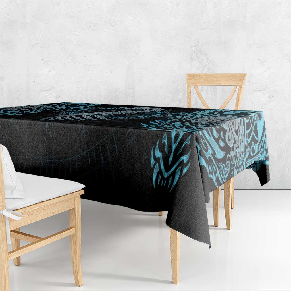 Black-and-blue dragon rune tablecloth draped over rectangular table