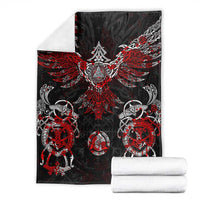 Viking rune blanket with red-and-white winged emblem, displayed with folded white towels