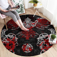Round red and black Viking rune carpet with ornate center emblem and skull motifs