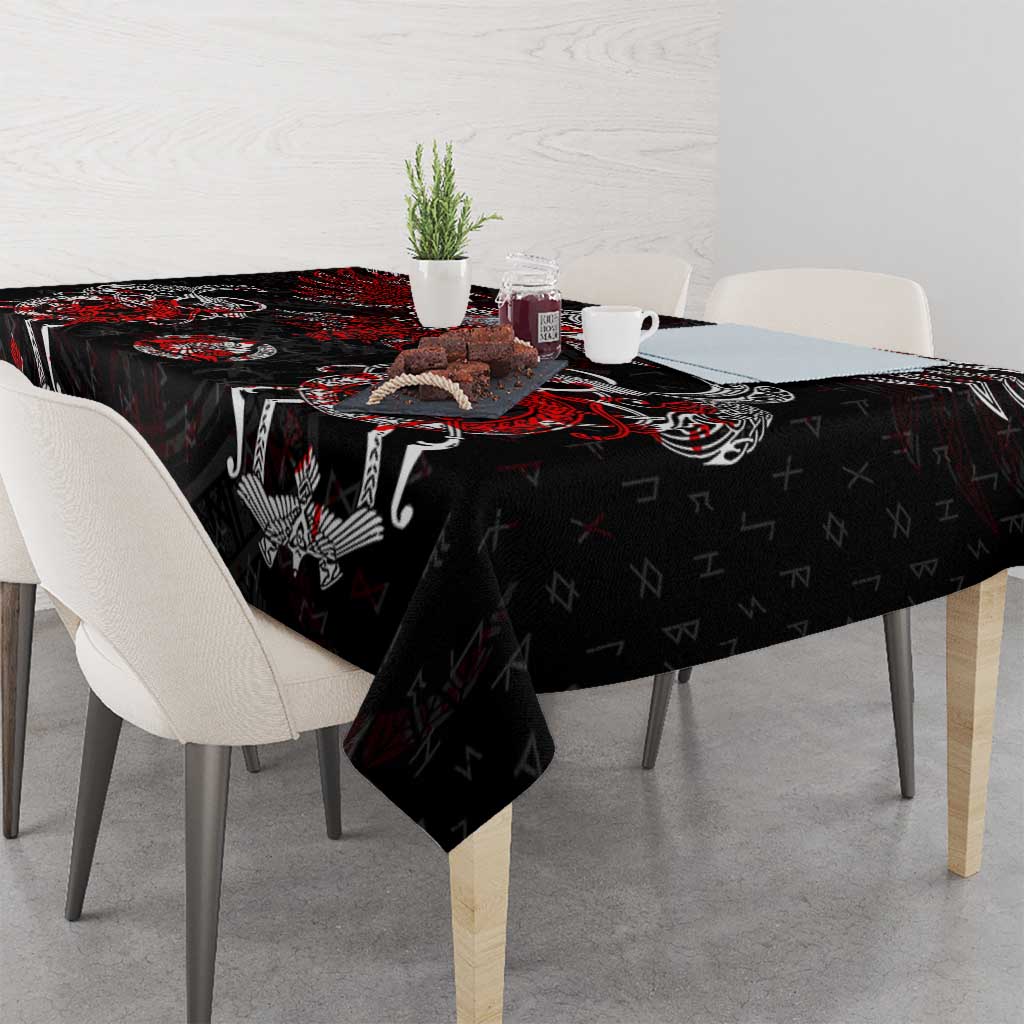 Black tablecloth with red raven, axe, and rune symbols, covering dining table