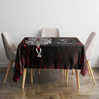 Norse dragon tablecloth on round table, black and dark red with knot emblem