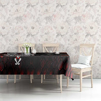 Norse dragon tablecloth with dark red and black design, draped across long table