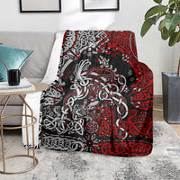 Viking warrior and dragon throw blanket in red, black, and white braid patterns