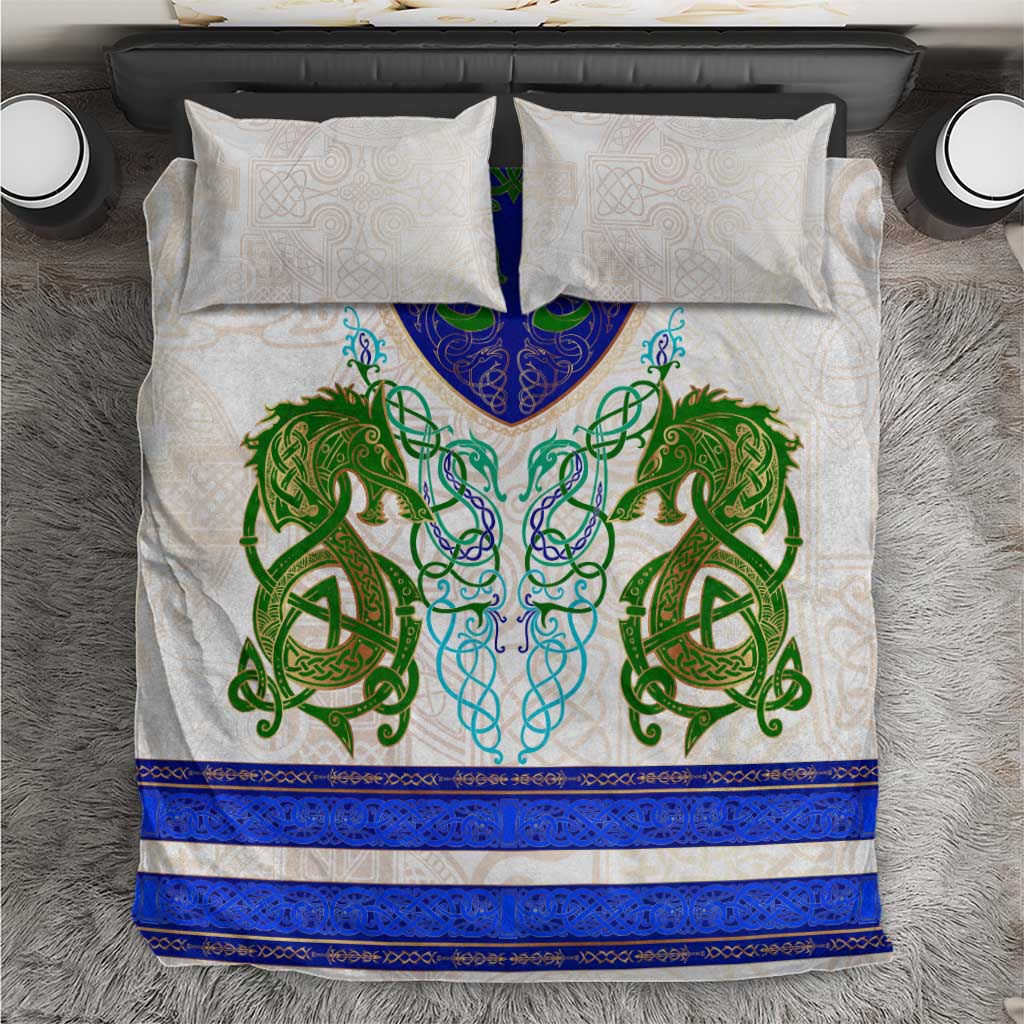 Bedding set with two white pillow shams and duvet with green dragon and blue trim